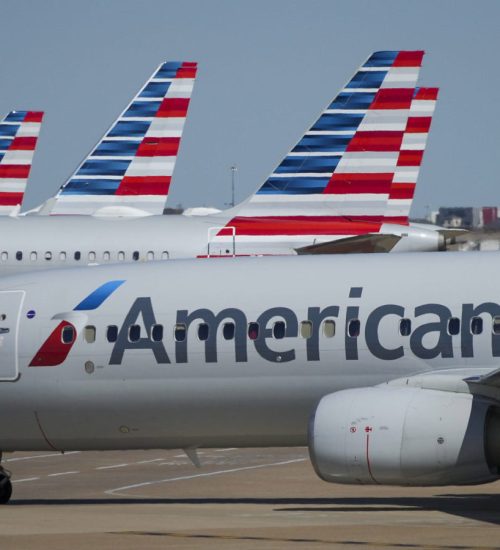 American Airlines planes are seen at the gates of Terminal C at DFW Airport on Saturday, Oct. 16, 2021. (Smiley N. Pool/The Dallas Morning News)