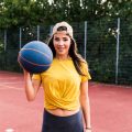 happy-young-woman-playing-basketball-2022-03-08-01-33-58-utc-e1659165101102.jpg